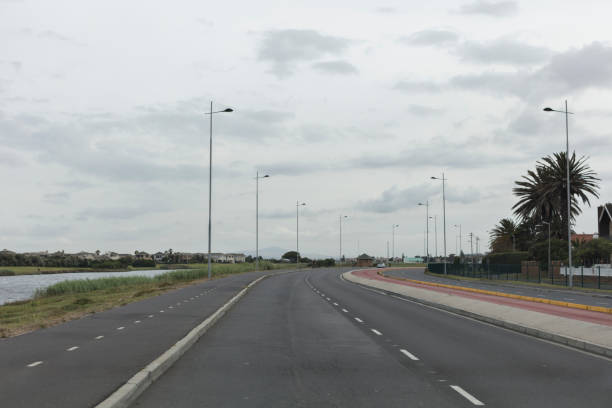 istock Empty Asphalt Road Near Lake 1227146269