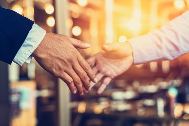istock Businessmen making handshake, finishing up a meeting 1227147827