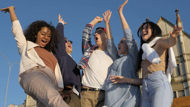 istock Friends team building putting their hands on each other 1227148182
