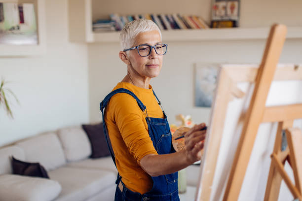 istock Mature artist painting 1227155070