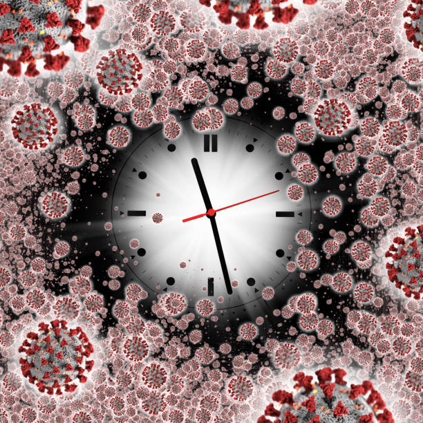 istock Global epidemic concept of viruses and clock face 1227156266
