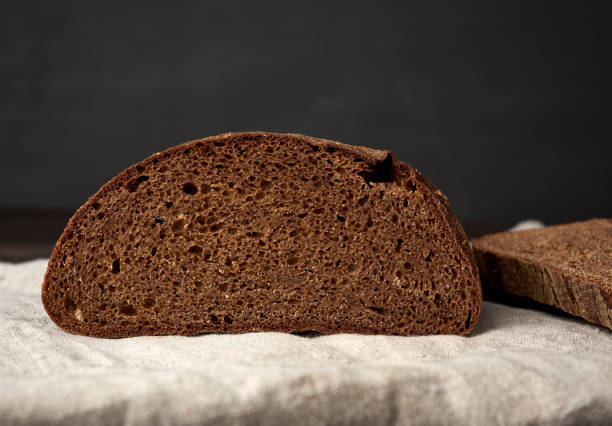 istock sliced oval rye bread bread on a wooden board 1227159858