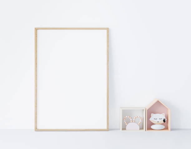 Mock up frame poster in kids room with wooden frame and children toys, stock photo Mock up frame poster in kids room with wooden frame and children toys, close up minimal design, stock photo nursery bedroom photos stock pictures, royalty-free photos & images