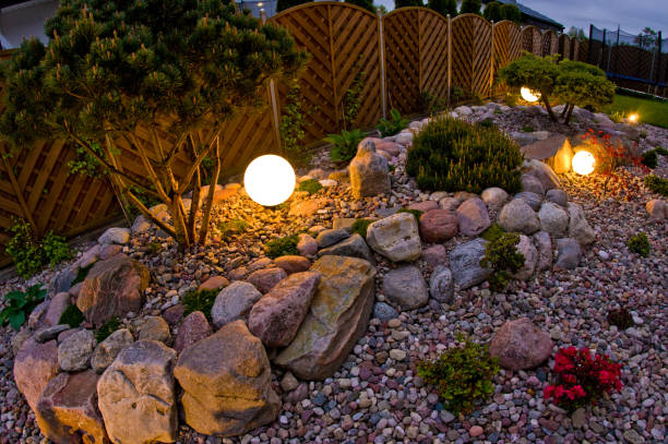 istock Home garden at night, illuminated by globe shaped lights. 1227165786