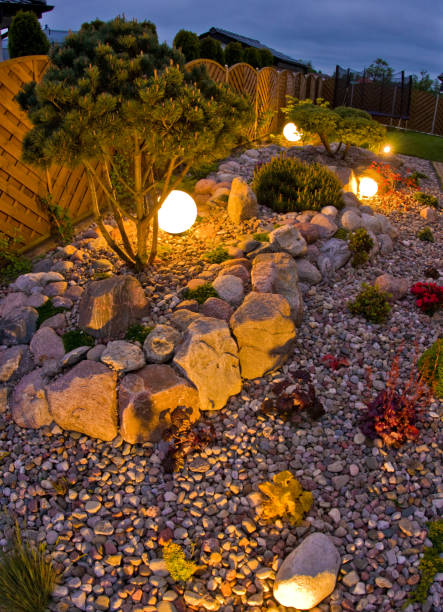 istock Home garden at night, illuminated by globe shaped lights. 1227165986