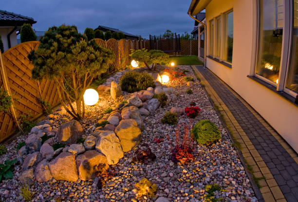 istock Home garden at night, illuminated by globe shaped lights. 1227166188