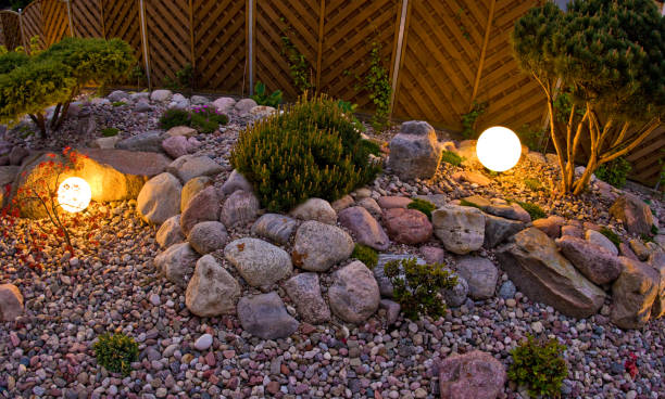 istock Home garden at night, illuminated by globe shaped lights. 1227166853