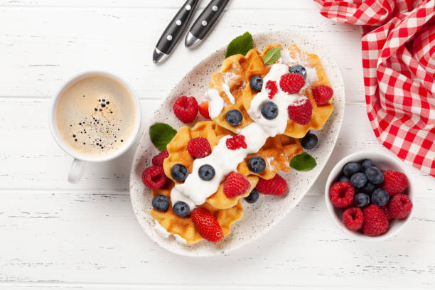 istock Delicious belgian waffles with summer berries 1227170693