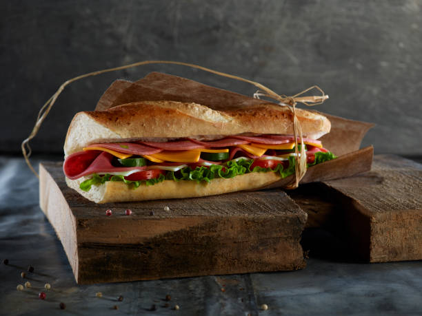 istock delicatessen sandwich on wooden plate 1227171409