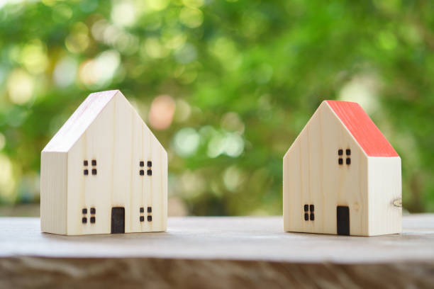 istock a model house model .using as background business concept and real estate concept with copy space for your text or design. 1227173840