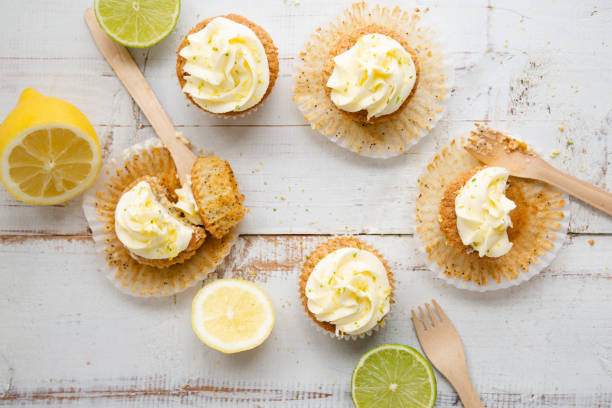 istock Lemon and poppy seed cupcakes with cheese cream frosting 1227176604