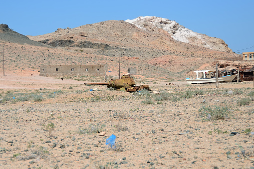 Rusty soviet battle tank T-34 in Qalansiya village. Lagoon Detwahat the Socotra Island, Yemen