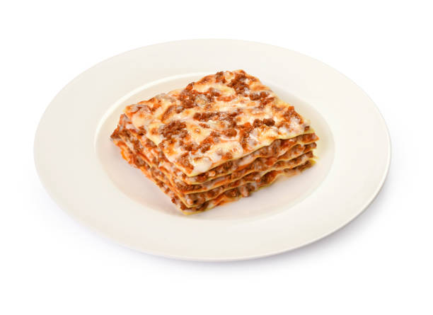 Bolognese Lasagna Baked lasagna with meat sauce, served in the plate, isolated on a white background pasta casserole stock pictures, royalty-free photos & images