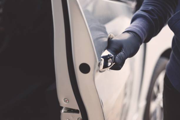 istock The robber is stealing the car 1227183588