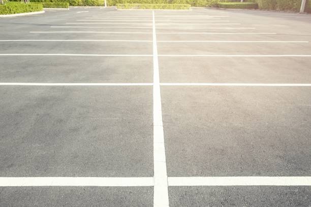 istock Car parked in asphalt parking lot and empty space at the mall 1227184349