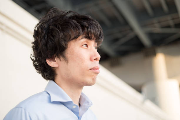 istock 30s asian man portrait 1227185471