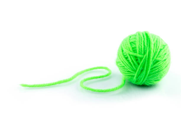 istock yarn color green on white background. 1227188363