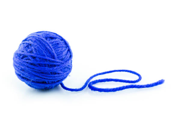 istock yarn color blue on white background. 1227188540