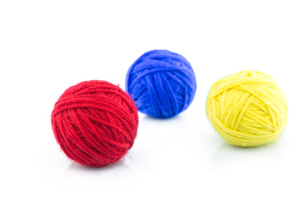istock yarn color red, blue, yellow on white background. 1227189557