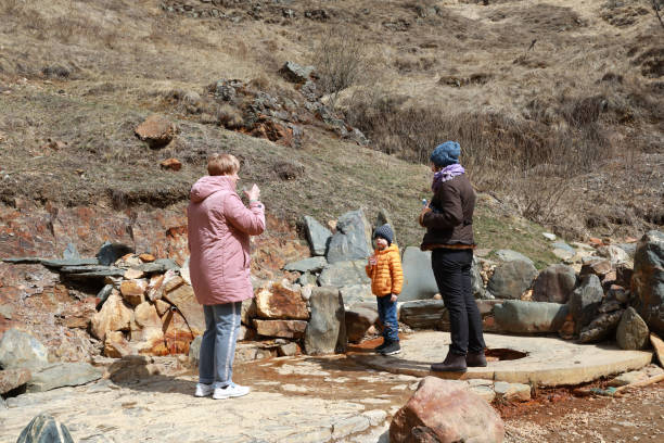 istock People drinking mineral water in Narzan Valley 1227189701