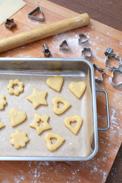 istock Baking tray full of unbaked cookies 1227190975