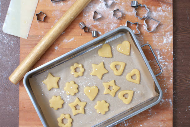 istock Baking tray full of unbaked cookies 1227190976