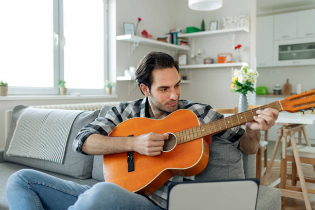 istock Acoustic Guitar Lessons 1227191914