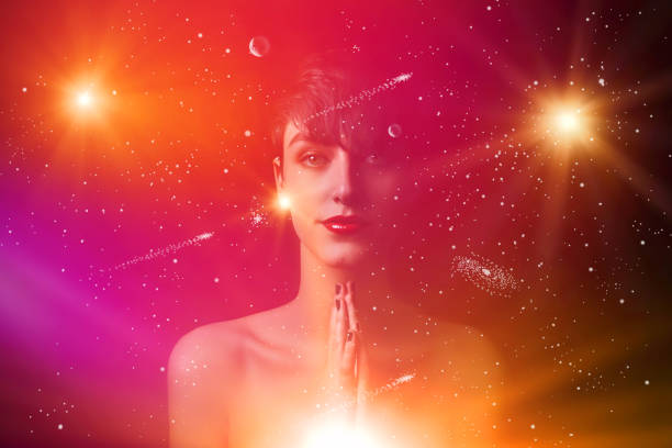 young woman surrounded by the universe - ring galaxy imagens e fotografias de stock