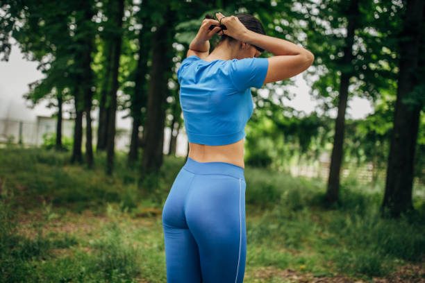 istock Fit woman preparing for jogging in park 1227192986
