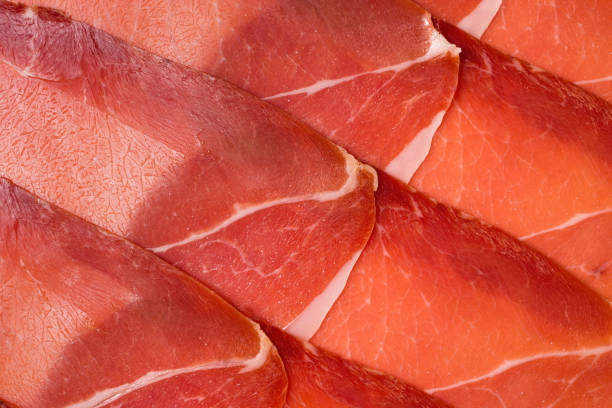 istock Tasty meat background, thinly sliced jamon. 1227195334