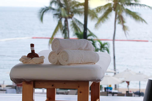 Luxury massage and spa bed put at the hotel near the beach seascape nice view for relaxing background