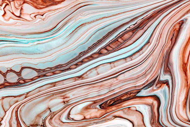 istock Fluid art texture. Abstract backdrop with swirling paint effect. Liquid acrylic picture with flows and splashes. Mixed paints for background or poster. Brown, turquoise and black overflowing colors. 1227197042