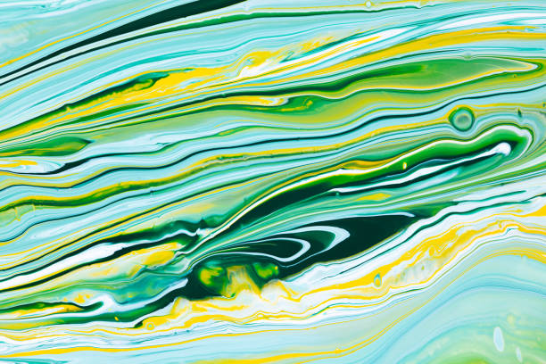 istock Fluid art texture. Backdrop with abstract swirling paint effect. Liquid acrylic artwork that flows and splashes. Mixed paints for interior poster. Blue, yellow and green overflowing colors. 1227197083
