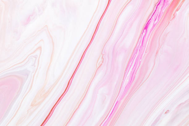 istock Fluid art texture. Abstract background with iridescent paint effect. Liquid acrylic picture that flows and splashes. Mixed paints for background or poster. Pink, white and beige overflowing colors. 1227197164