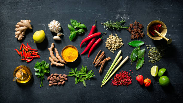 istock Herbs and spices for cooking on dark background 1227198308