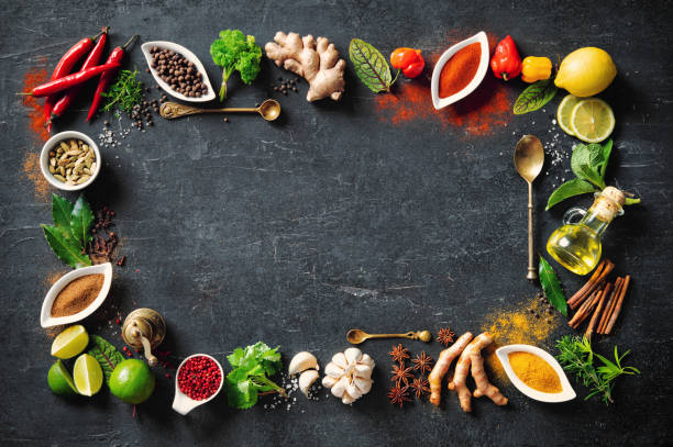 istock Colourful various herbs and spices for cooking on dark background 1227198311