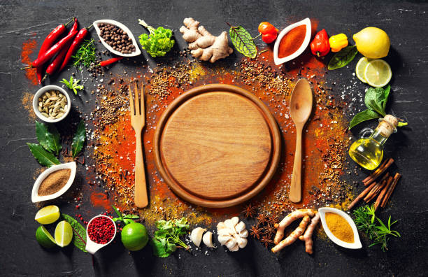 istock Colourful various herbs and spices for cooking on dark background 1227198323