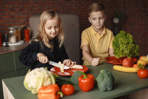 istock Children prepare salan in a kitchen 1227198948