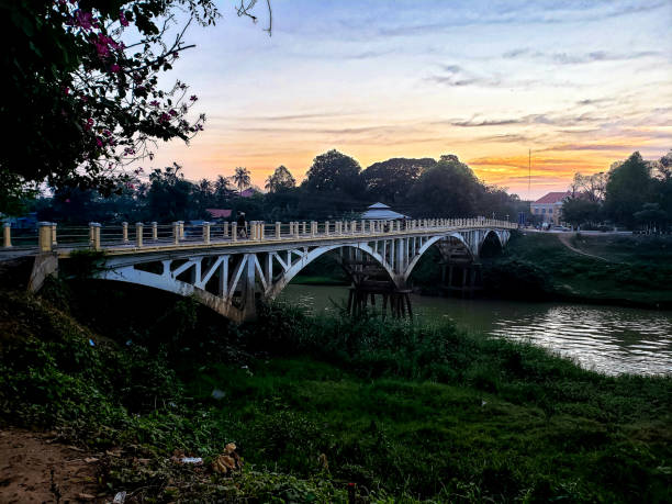 istock Battambang, Cambodia, January 02, 2020: city bridge during sunset 1227199749