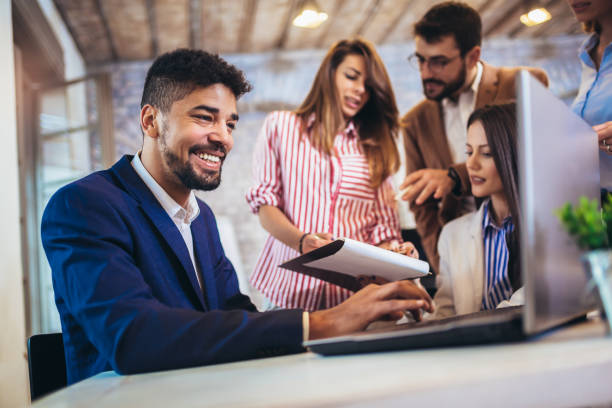 istock Business people working together in modern office. 1227200283