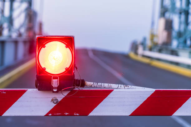 istock stop sign light on the stop bar on the road. 1227201791