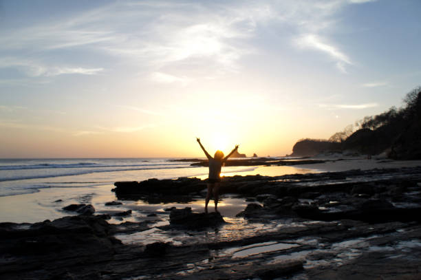 istock Sunset in the beach - Happy person 1227203153
