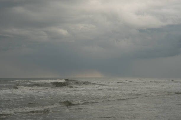 istock Ocean waves with storm clouds in the background 1227204879