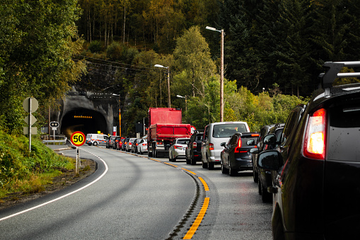 Norway, waiting outside a tunnel with many other cars as one of the lanes are closed due to construction work