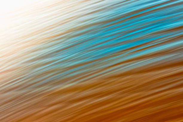 istock Abstract seascape with blurred panning motion. Sunset over the sea. Tranquil scene, light blue and yellow colors 1227205625