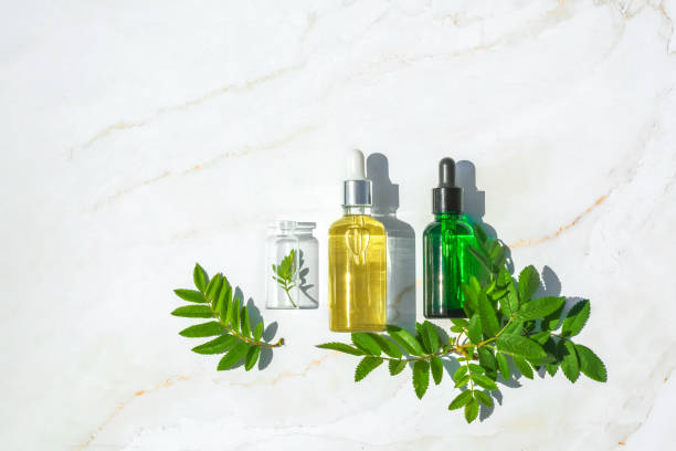 istock Serum with herbal extracts for skincare. Flat Lay minimalism 1227205835