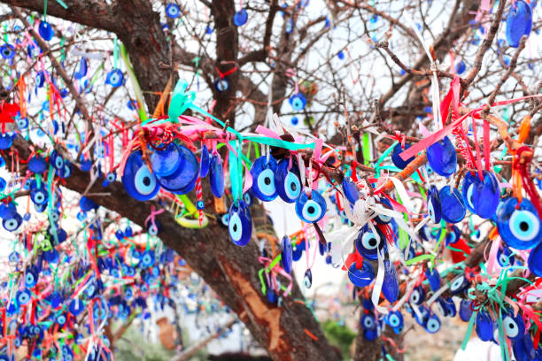 istock Evil eye charms hang from a tree, Cappadocia, Turkey 1227209705