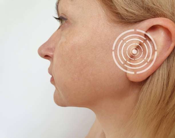 istock woman ear hurts 1227209914