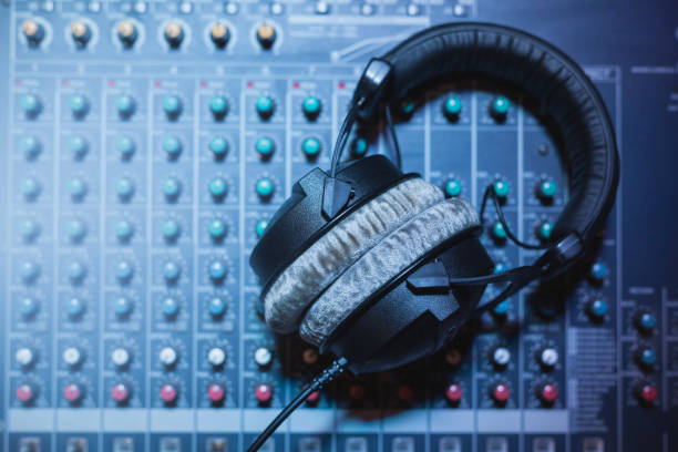 istock Headphones on the sound mixer 1227210392