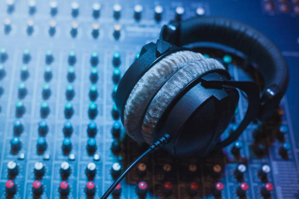 istock Headphones on sound mixer 1227210957